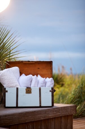 trunk, pillows and beach