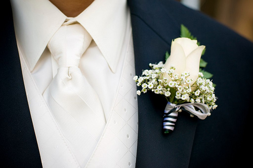 man, white rose and style