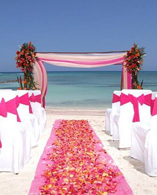 aisle, rose petals and beach wedding