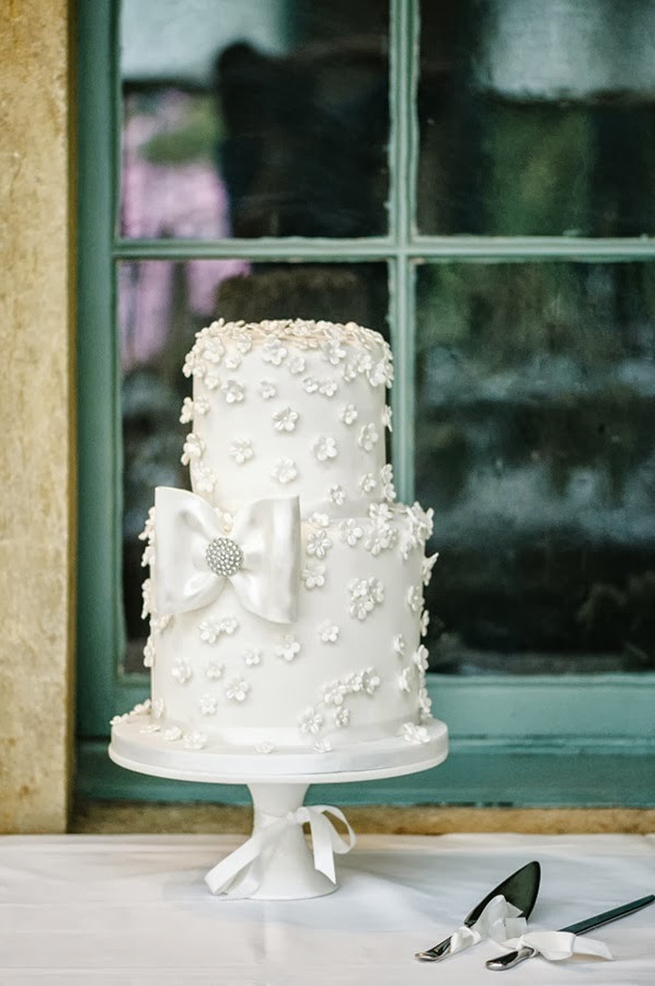 cake, bow, reception and white cake and flowers