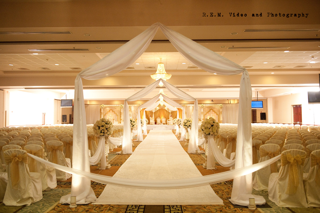 fabric archways, floral arrangements and wedding decor