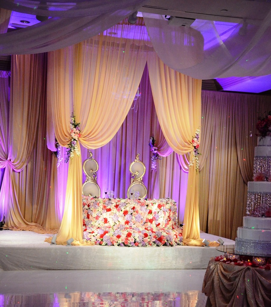 wedding design, ornate chairs, sweet heart table and cascading floral