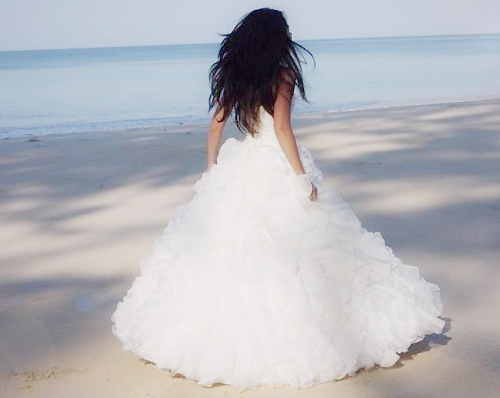wedding dress, sand and hair