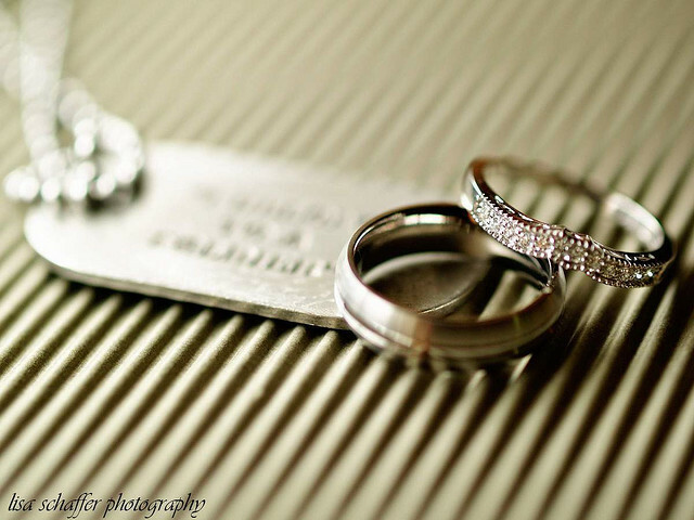 wedding rings, dog tag and rings