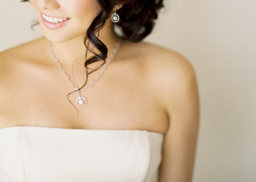earrings, curls and brunette