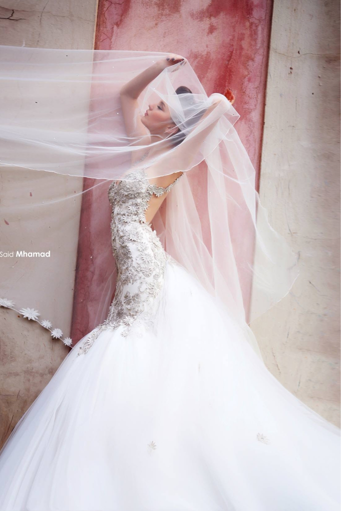 model, white, photographer and wedding dress