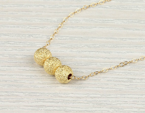 gold beads necklace, geometric necklace and stardust necklace