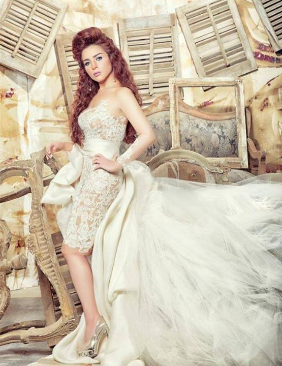 weird wedding dress and مي عز الدين
