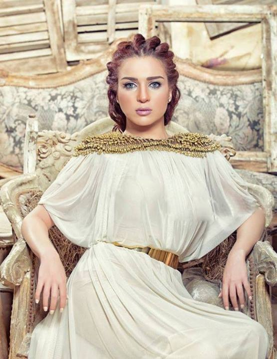 مي عز الدين and weird wedding dress