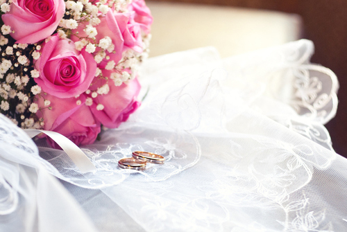 wedding rings, pink roses and gold