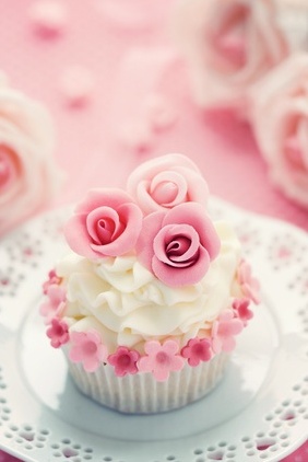 red cupcake, pink cupcake and wedding cake