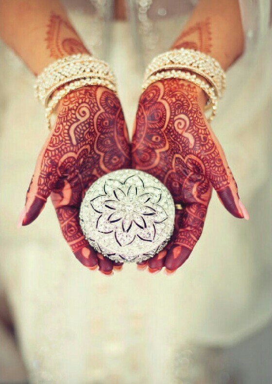 henna, silver, bangles and mehendi