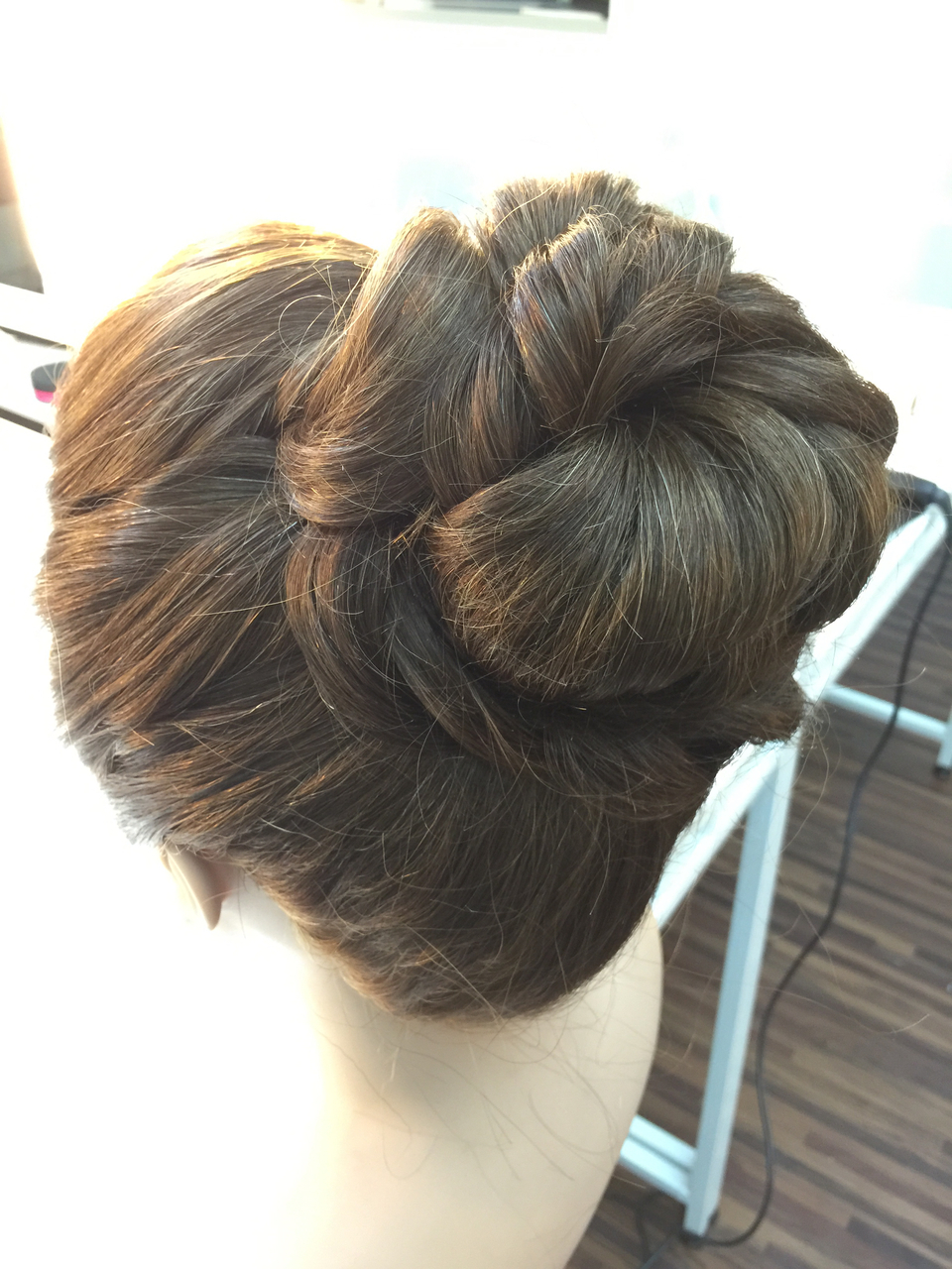 wedding hairstyling, up bun and bride hairdo