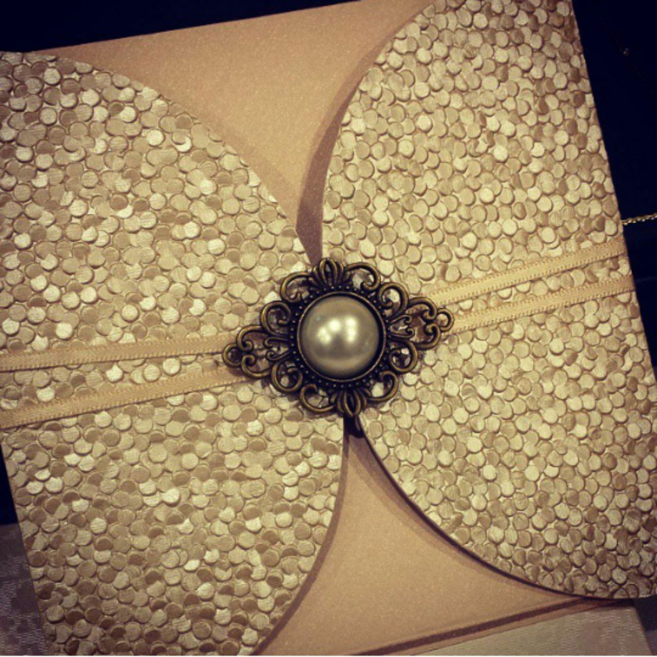 pebbles, gold, cards and design