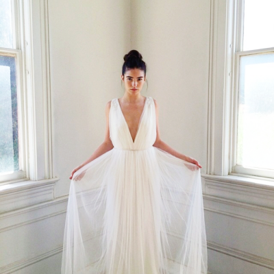 white dress, romantic and messy bun