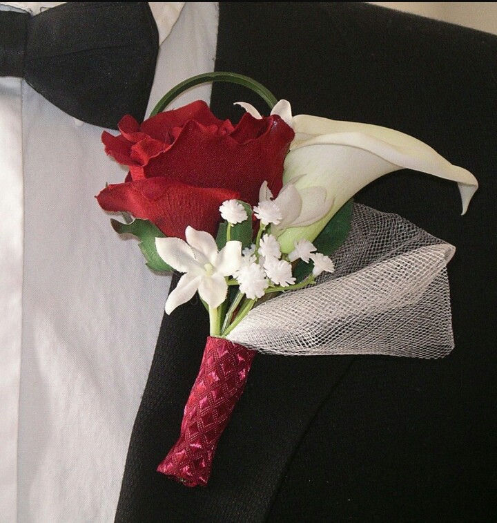 boutonniere, tuxedo, baby's breath and satin