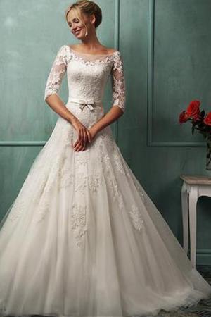 cut out back, lace wedding dress and a- line