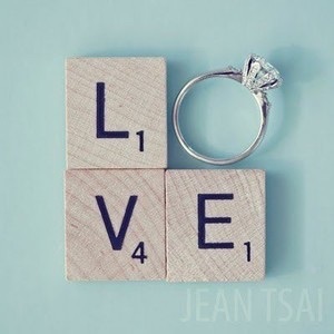 silver ring, scrabble and letters