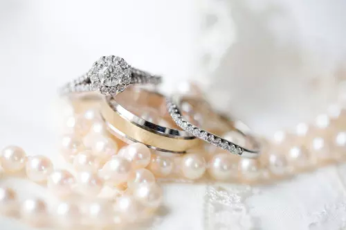rings, wedding card and wedding crown
