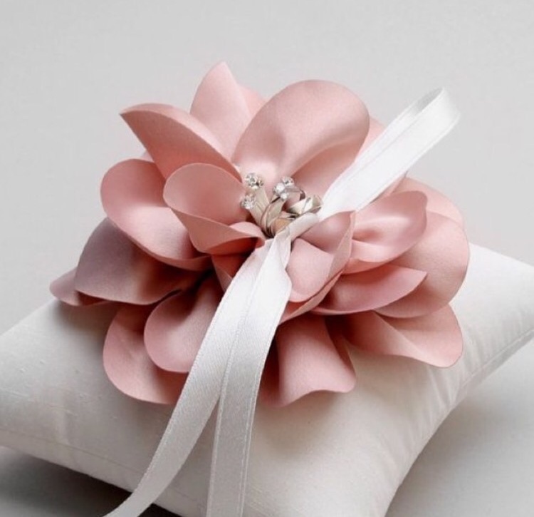 white pillow, wedding rings, simple and elegant and blush pink