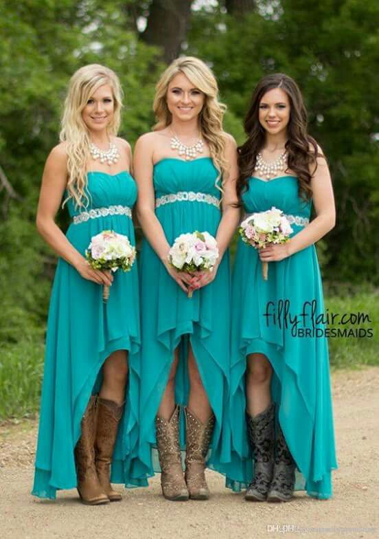blue dress, brides maids, cowboy boots and dresses and country themed wedding
