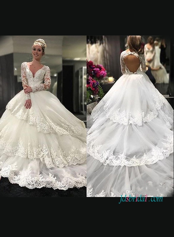 plunging neckline, brides dress, bridal dress and tiered tulle bottom