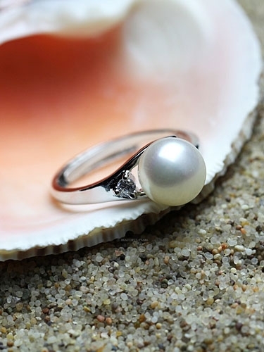 wedding ring, pearl ring and ring