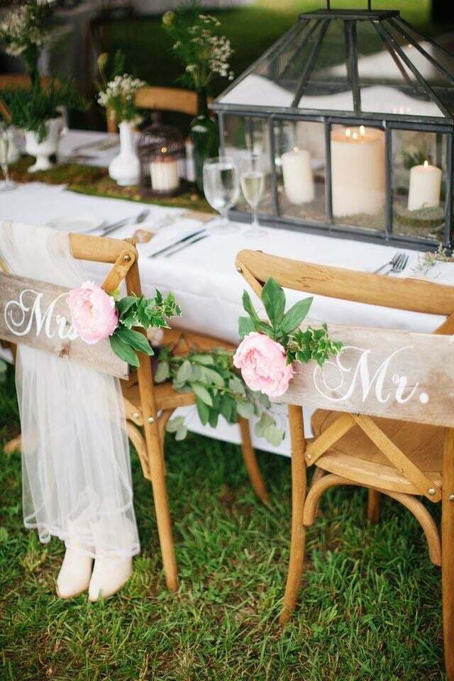 bride, groom, decoration and chairs