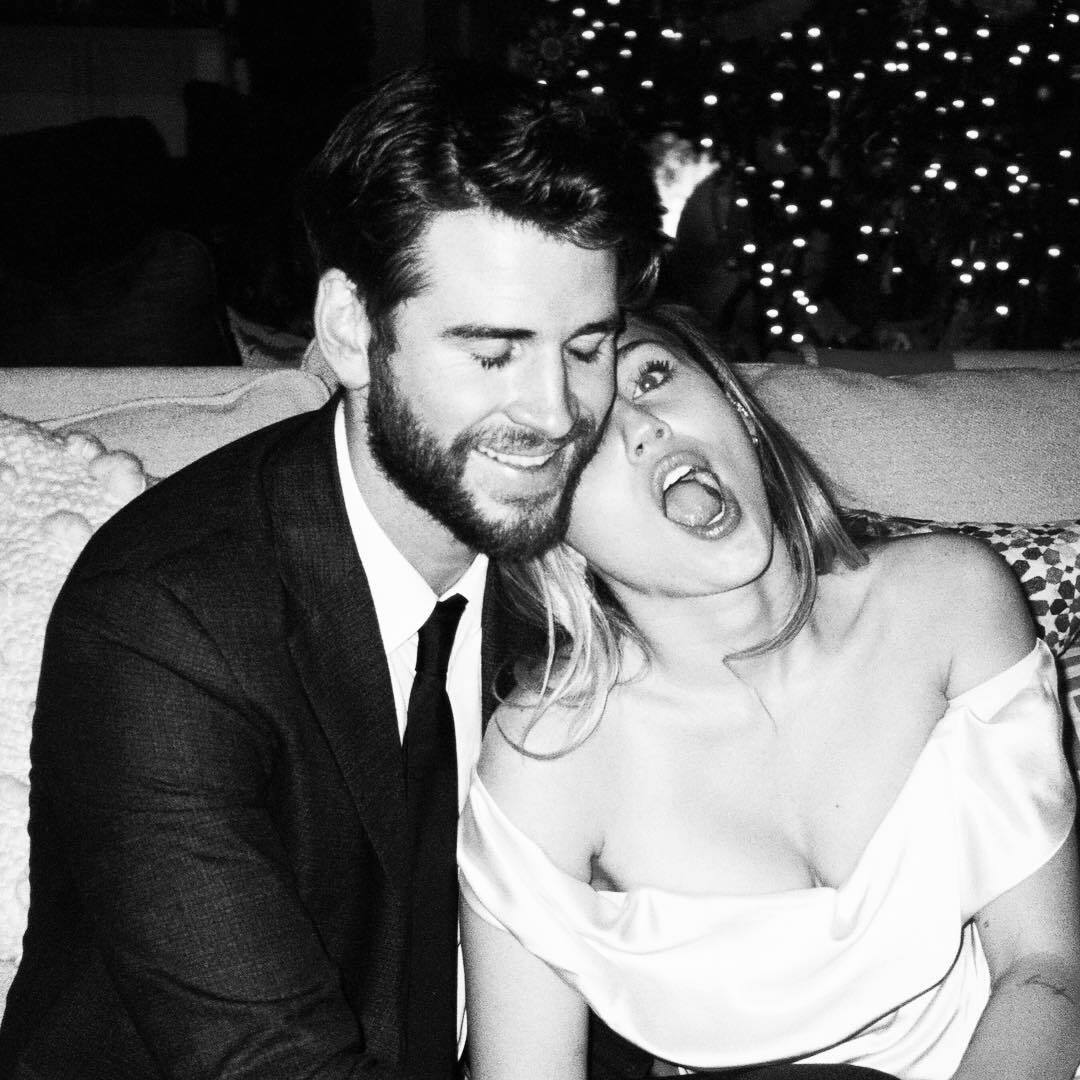 black and white, couple, liam hemsworth and miley cyrus