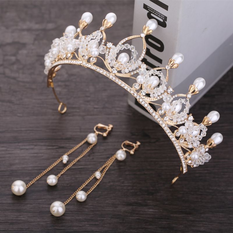 headpieces, tassel earrings, gold accessories and bridal hair accessories