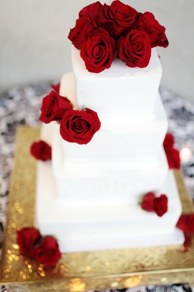 white cake, red roses and roses