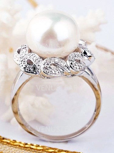 ring, wedding ring and pearl jewelry