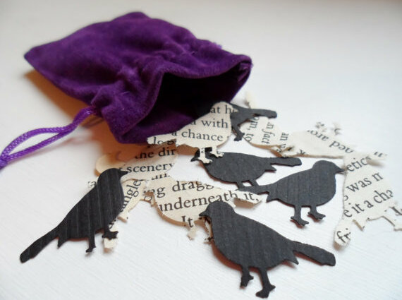 old books, text and black birds