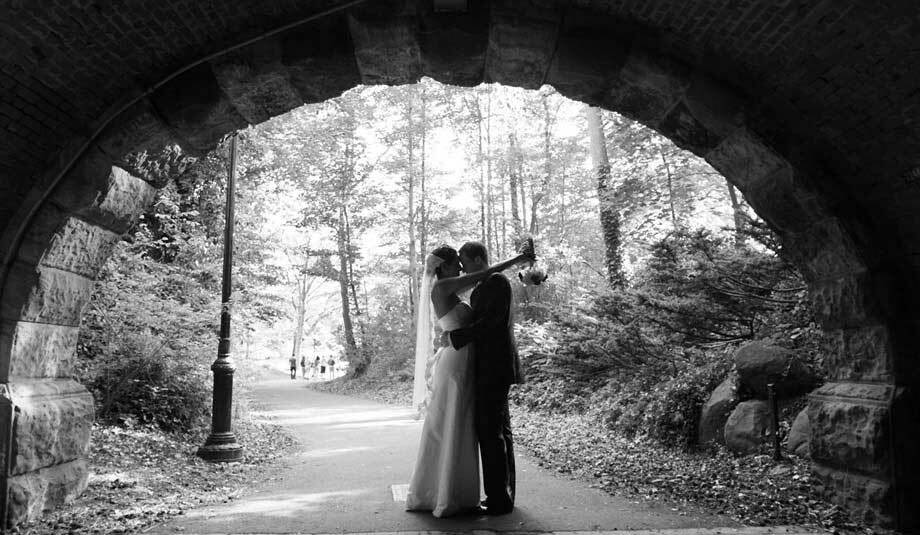 bride and groom, black and white, black dress and bridge