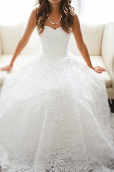 ball, pearl necklace and gown