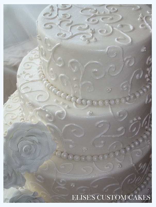 peals and swirls, off-center wedding cake, pearls wedding cake and white wedding cake