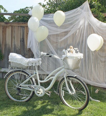 white balloons, bike and veil