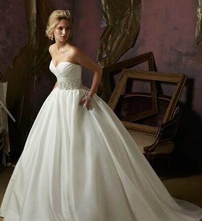 girl, makeup and ball gown wedding dress