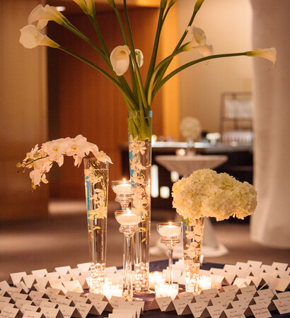 wedding decor, flower arrangements and romantic candlelight