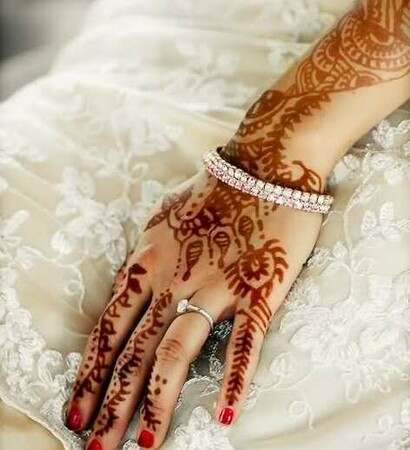 henna, red and jewelry