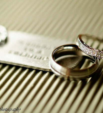 wedding rings, dog tag and rings