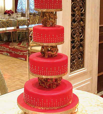 a mazing, wedding cake and gold ornate wedding cake