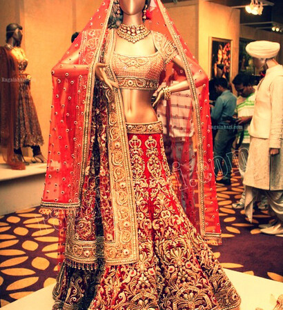 red, wedding lehenga and bride