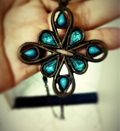 medallion, necklace and blue