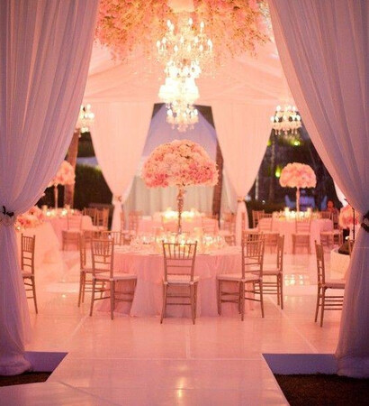 groom, bride and pink flowers