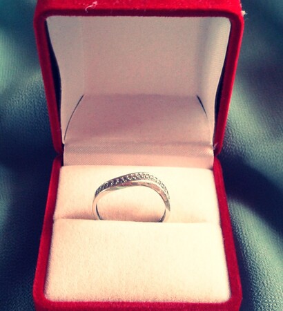 engagement ring, wedding ring and fiancee