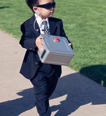 ring, bearer and men in black