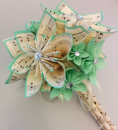 sheet music, wedding boquet and paper flowers