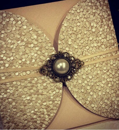 pebbles, gold and cards