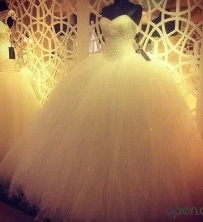 white dress, sweetheart neckline and poofy
